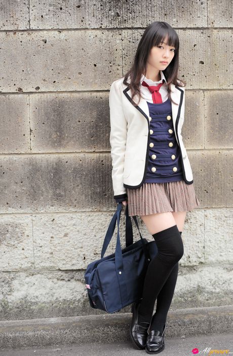 Asian cutie Haruka Ando highlights her small tits and poses in stockings