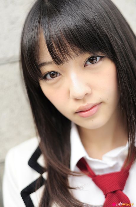 Asian cutie Haruka Ando highlights her small tits and poses in stockings