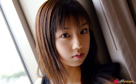 Asian beauty Yuko Ogura shows her tiny boobs and bald pussy in a solo