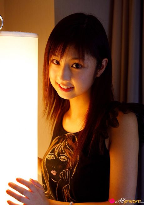 Asian beauty Yuko Ogura shows her tiny boobs and bald pussy in a solo