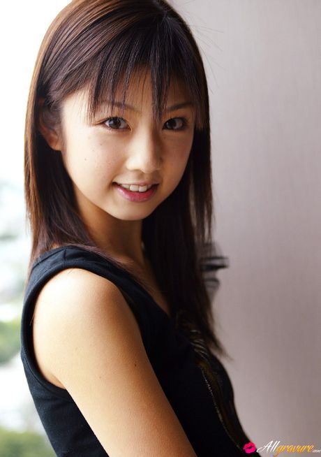 Asian beauty Yuko Ogura shows her tiny boobs and bald pussy in a solo