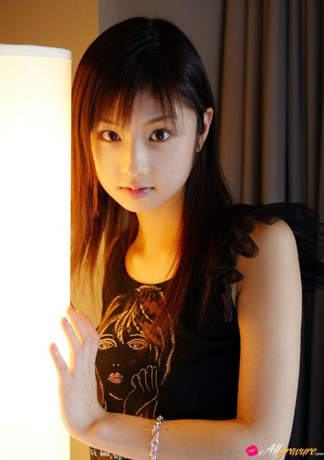 Asian beauty Yuko Ogura shows her tiny boobs and bald pussy in a solo