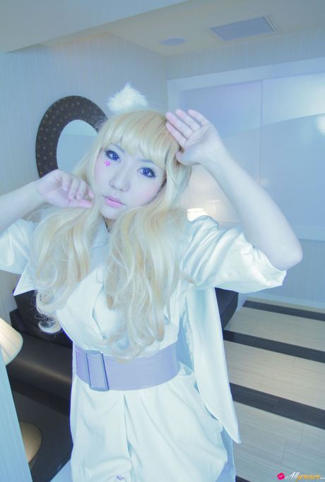 Asian cutie Saku gets naked in white stockings before a bath