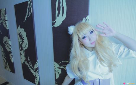 Asian cutie Saku gets naked in white stockings before a bath