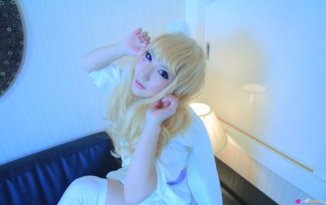 Asian cutie Saku gets naked in white stockings before a bath