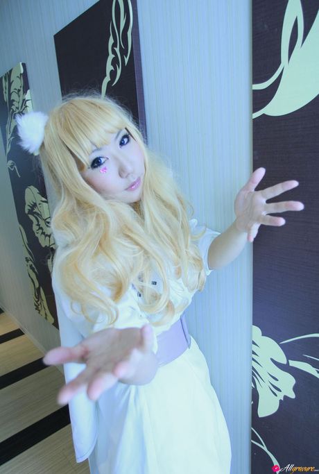 Asian cutie Saku gets naked in white stockings before a bath