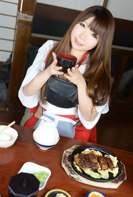 Asian beauty Ran displays her amazing juggs and ass in white stockings