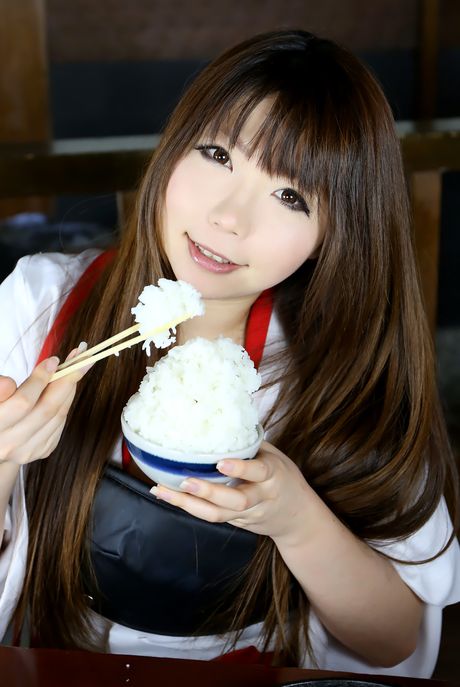 Asian beauty Ran displays her amazing juggs and ass in white stockings