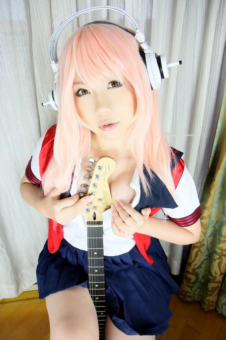 Pink haired teen Higurashi Rin flaunts her petite small tits and pussy in a solo