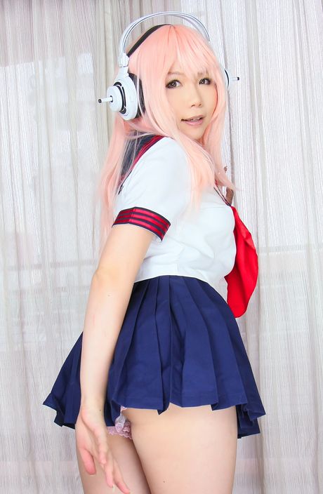 Pink haired teen Higurashi Rin flaunts her petite small tits and pussy in a solo