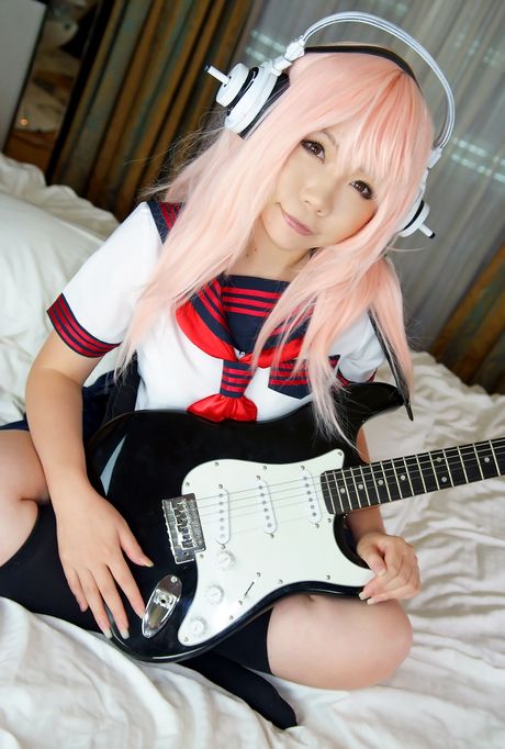 Pink haired teen Higurashi Rin flaunts her petite small tits and pussy in a solo