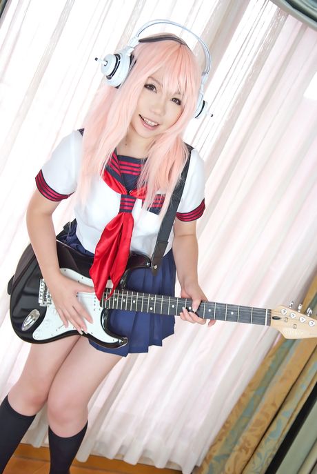 Pink haired teen Higurashi Rin flaunts her petite small tits and pussy in a solo