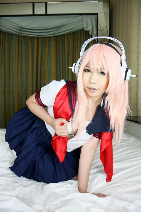 Pink haired teen Higurashi Rin flaunts her petite small tits and pussy in a solo