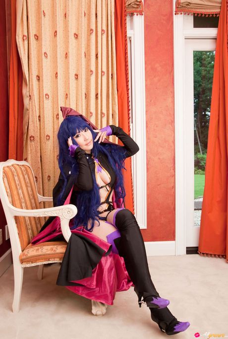 Asian covergirl Saku displays her big racks and poses in a solo