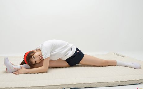 Lean japanese babe Mizuho Shiraishi shows her flat tits and poses in white socks