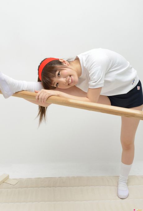 Lean japanese babe Mizuho Shiraishi shows her flat tits and poses in white socks