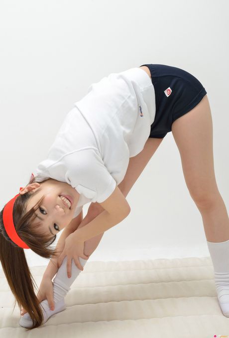 Lean japanese babe Mizuho Shiraishi shows her flat tits and poses in white socks