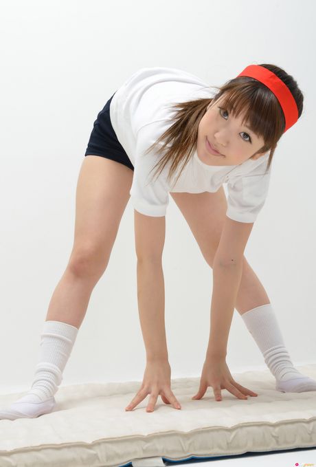 Lean japanese babe Mizuho Shiraishi shows her flat tits and poses in white socks