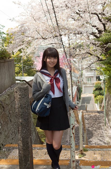 Schoolgirl Yuuri Shiina demonstrates her petite tiny tits and bald pussy