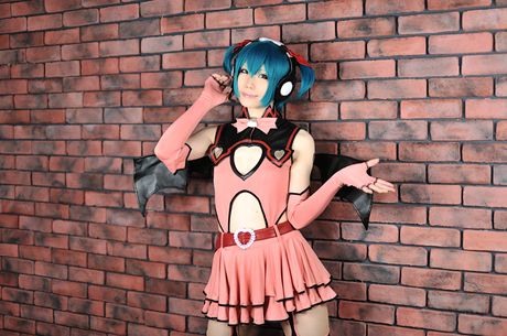 Gorgeous Haruka demonstrates her perfect booty and poses in a pink costume