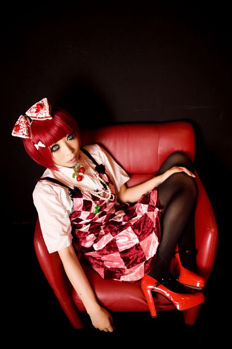 Hot japanese ginger Momoiro Reku shows her nice tits and poses in stockings