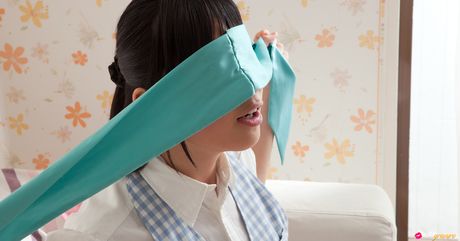 Asian cutie Tomoe Yamanaka flaunts her nice tits and pussy in a solo