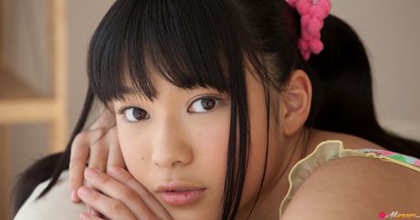 Asian cutie Tomoe Yamanaka flaunts her nice tits and pussy in a solo