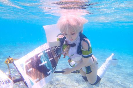 Asian teen Saku unveils her big juggs and poses in a sexy outfit