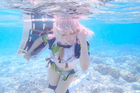 Asian teen Saku unveils her big juggs and poses in a sexy outfit