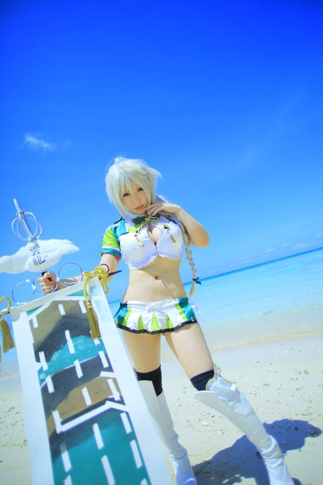 Asian teen Saku unveils her big juggs and poses in a sexy outfit