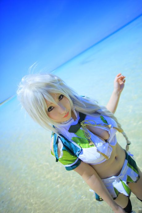 Asian teen Saku unveils her big juggs and poses in a sexy outfit