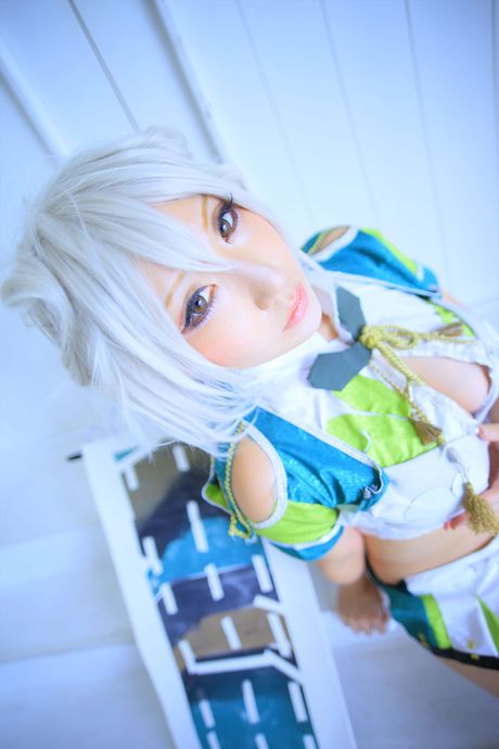 Asian teen Saku unveils her big juggs and poses in a sexy outfit