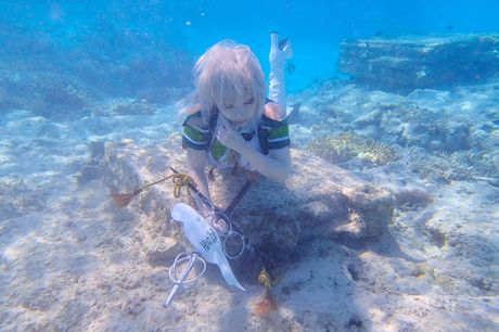 Asian teen Saku unveils her big juggs and poses in a sexy outfit