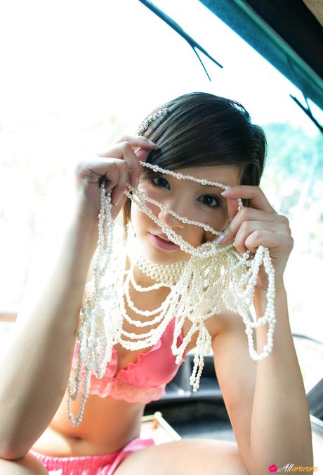 Asian teen Rina Nagasaki doffs her dress and demonstrates her hot body