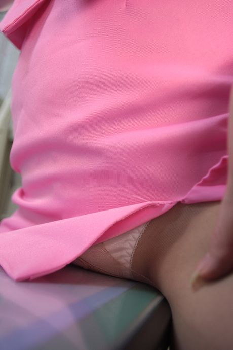 Brown eyes and hair add to her allure as she flaunts her nice ass