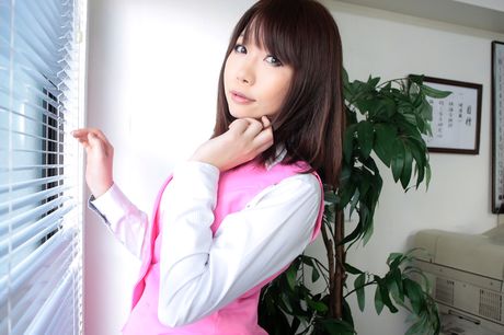 Brown eyes and hair add to her allure as she flaunts her nice ass