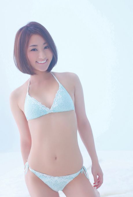 Brown-eyed Japanese babe Mika Yoshinaga strips and poses in a solo