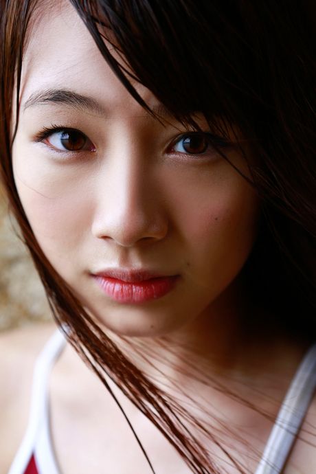 Asian doll Ayumi Ishida takes off her swimsuit in the pool