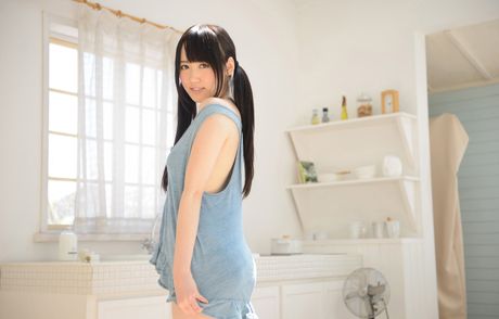 Asian babe Arisa removes her clothes and displays her big booty in a solo