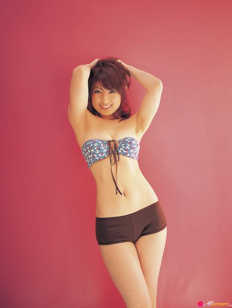 Asian chick Yoko Kumada shows her amazing boobs and poses in a solo