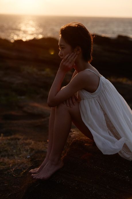 Asian beauty Haruka Kudo shows her nice tits and poses in a solo