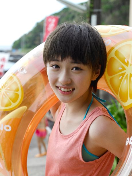 Asian beauty Haruka Kudo shows her nice tits and poses in a solo