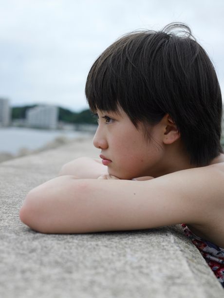 Asian beauty Haruka Kudo shows her nice tits and poses in a solo