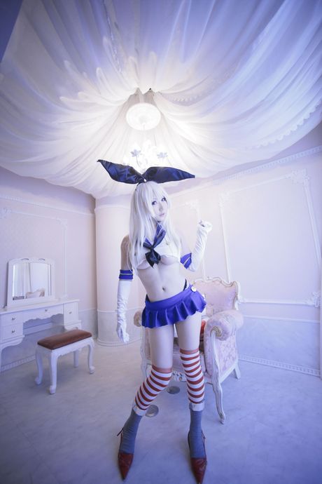 Blonde japanese covergirl Saku models in a black thong and striped socks