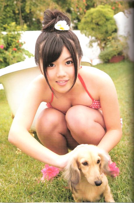 Asian girl Miyazaki Miho removes her bikini and demonstrates her amazing melons