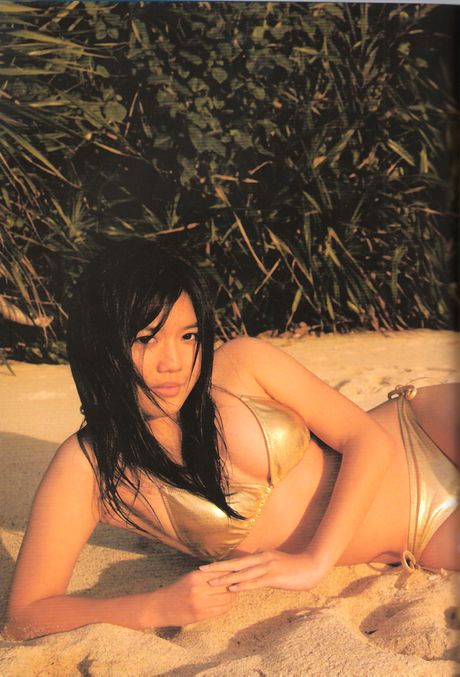 Asian girl Miyazaki Miho removes her bikini and demonstrates her amazing melons