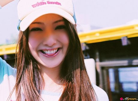 Devastating Asian teen Nozomi Sasaki displays her petite small tits and poses in a solo