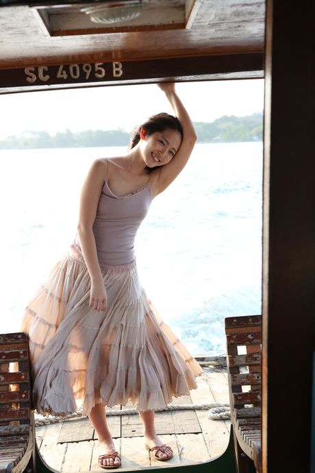 Airi Suzuki exposes her teeny tits and models in the raw in a solo