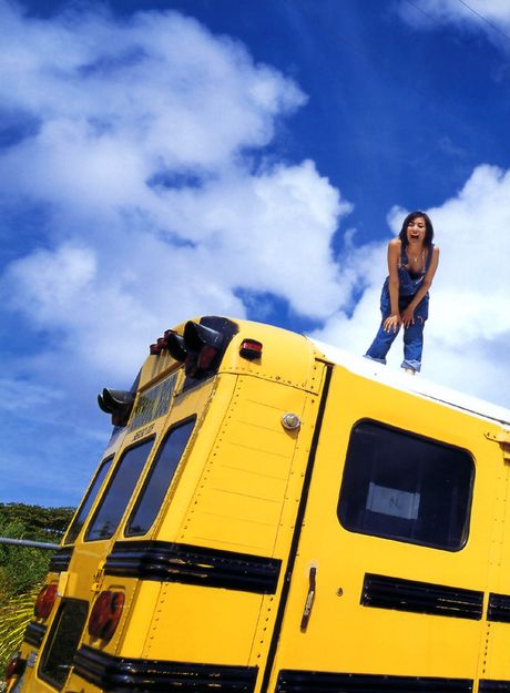 Asian girl Aiki Ito reveals her amazing tits and poses in a bikini