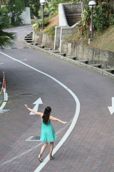 Asian teen Airi Suzuki shows her teeny tits and stands revealed in the nude outdoors